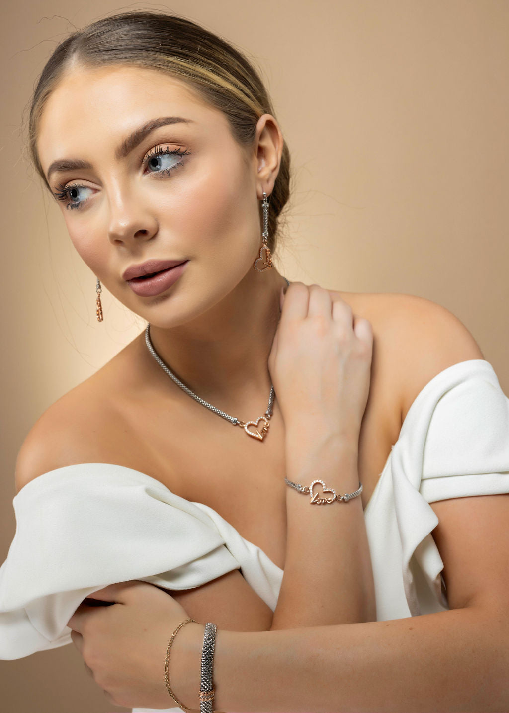 A woman wearing luxury jewelry