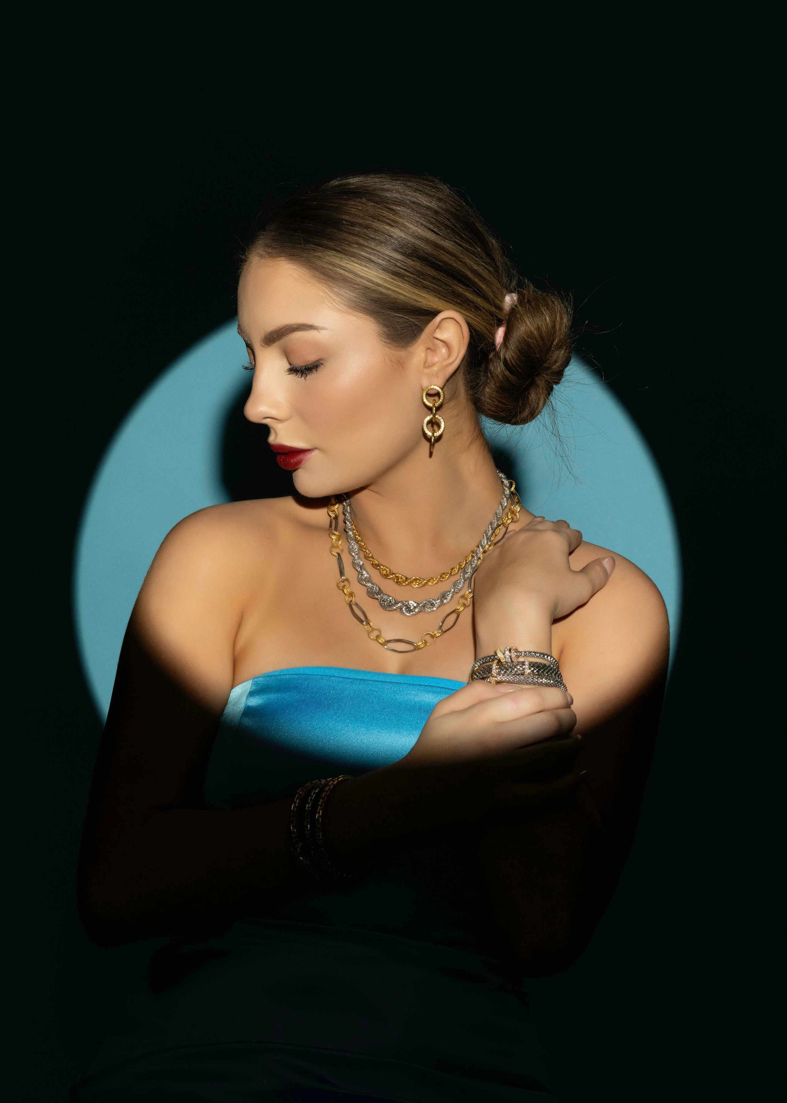 A woman wearing luxury jewelry